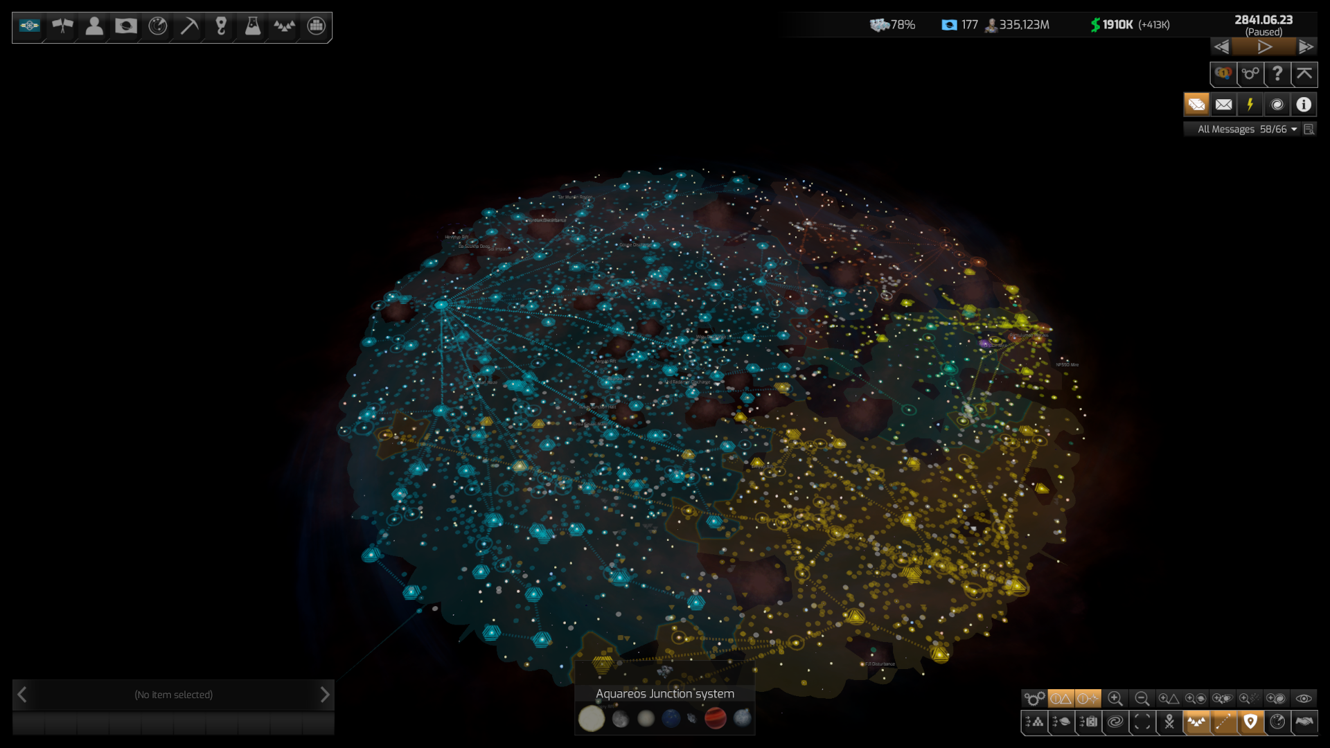 A screenshot of Distant World's main screen. In the center is a zoomed out view of a spiral galaxy, overlayed with colors for the political association of an area. The entire western half of the galaxy is covered in a light blue, representing my own empire. In the bottom right is another relatively large empire taking about another 1/4 of the galaxy, and then there are three more empires covering the remaining top right quarter of the galaxy. Also displayed are stylized symbols for large numbers of fleets, especially in my western half of the map, as well as very large numbers of symbols for single ships. Along the top left of the screen are a number of buttons to access menus. From left to right, these are: The flag of my empire, allowing access to empire information. Next are two flags with their flagpoles crossed, representing the diplomacy screen. Then comes a stylized 'avatar', representing my character screen, followed by a sort-of radar display, representing the exploration screen. Next comes a pickax, for access to the mining screen and a crane hook, representing manufacturing. The last three buttons are a beaker for the research screen, a V formation of triangles for the fleets screen and finally some stacked boxes for the civilian ships screen. In the top right are a few symbols showing the empires state. The first one shows the current research project and the percentage to which it is completed. Then the number of colonies (177) and the number of citizens, 335 billion. then the current cash reserves at 1,9 million and the cash flow, currently +413k. Finally, there's the current date, showing 2741.06.23. Below it are some controls, allowing access to the game menu and victory conditions, the ingame wiki as well as pause/unpause controls. Along the right screen border is the message area, currently empty. At the bottom are a large number of buttons to configure what the main area shows. This allows switching to e.g. a diplomatic view, showing fleets attack ranges and so on. At the bottom left is the current selected item area. And because I'm not a smart man, I of course did not remember to actually select an item before making the screenshot.